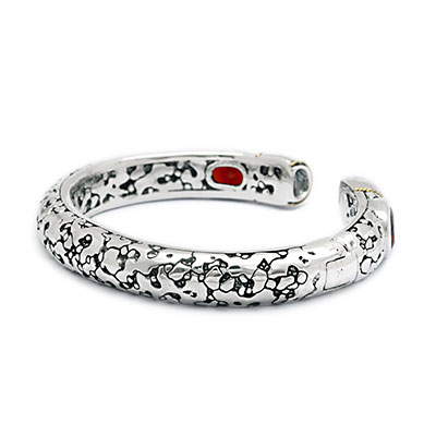 Silver and Gold Kick Cuff Bracelet with ornament and Plaster texture motif, Garnet oval 9x11
